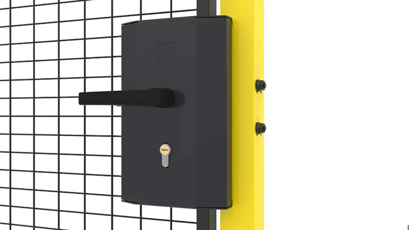 Close up on a black cylinder handle lock mounted on a door with mesh panel