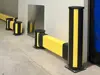 low impact barrier combined with impact bollard protection wall in warehouse environment